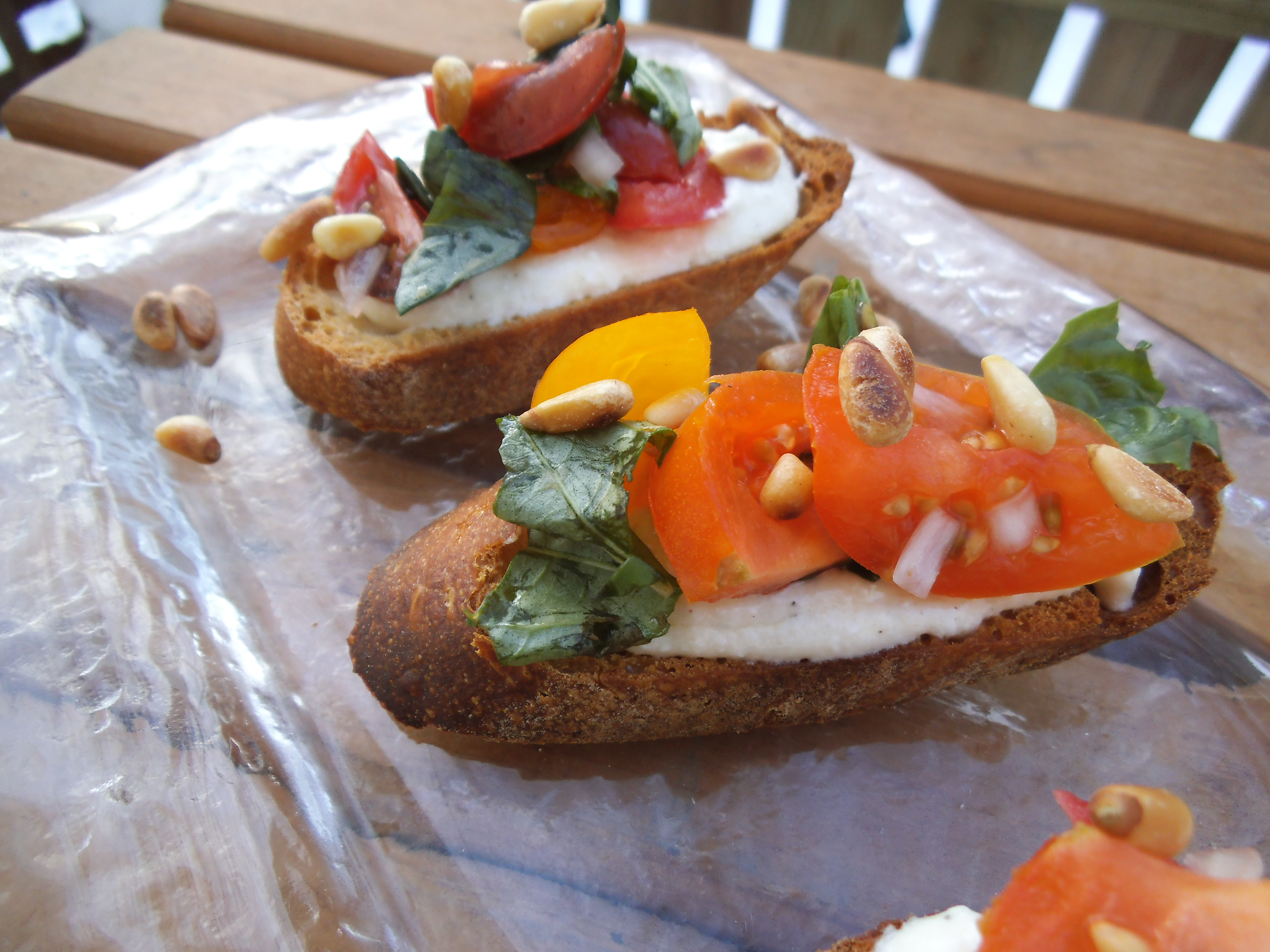 Heirloom Tomato Crostini with Whipped Feta - Creatively Delish